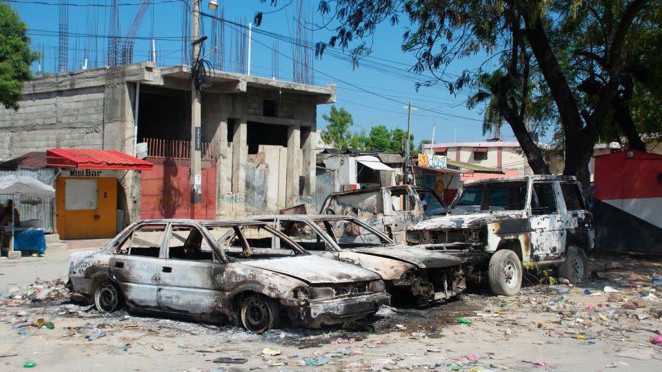 Charred vehicles remain as gang violence escalates in Port-au-Prince, Haiti, on March 9, 2024. - Clarens Siffroy/AFP/Getty Images