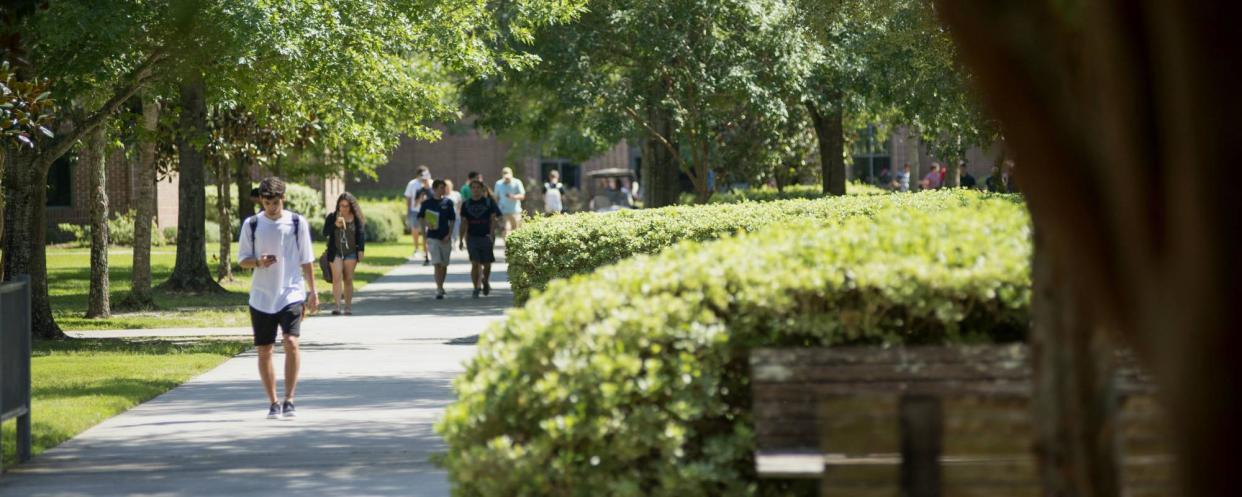 Students walk on Tallahassee Community College's campus.