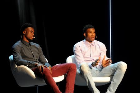 Greek basketball players, brothers Thanassis (L) and Giannis (R) Antetokounmpo attend an event at the Onassis Cultural Centre in Athens, Greece, June 24, 2017. REUTERS/Michalis Karagiannis