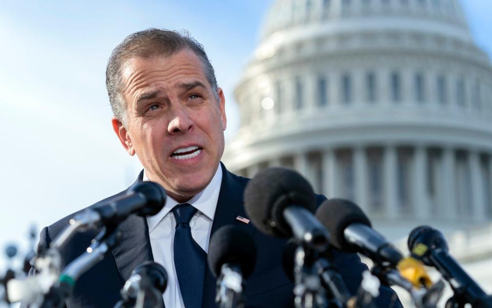 Hunter Biden, son of U.S. President Joe Biden, talks to reporters at the U.S. Capitol, in Washington, Wednesday, Dec. 13, 2023