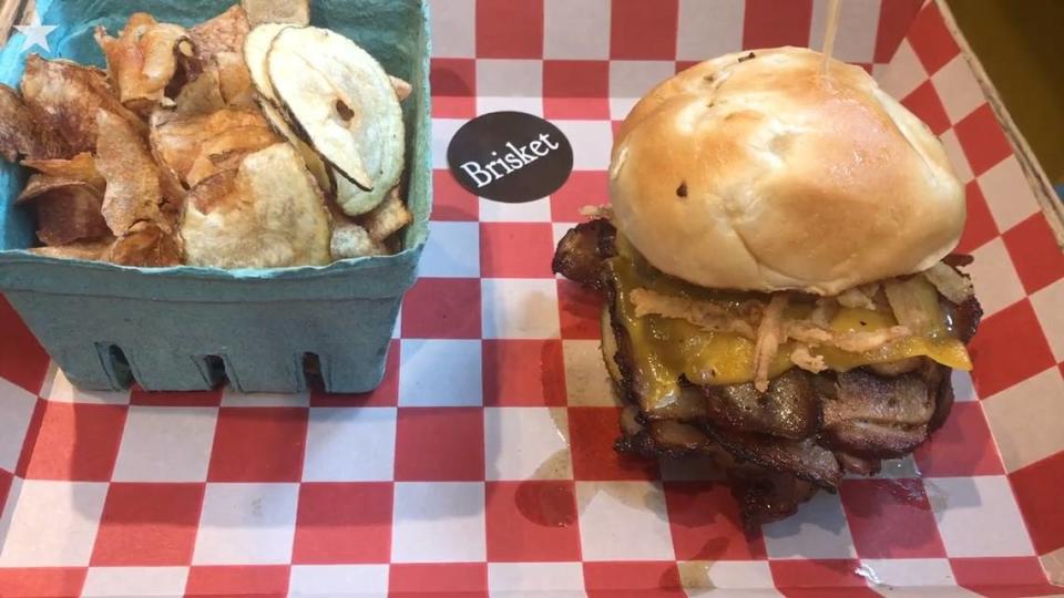 Andy Reid loves the sandwiches at Pigwich. This one is the pork brisket sandwich with a side of fresh fried chips.