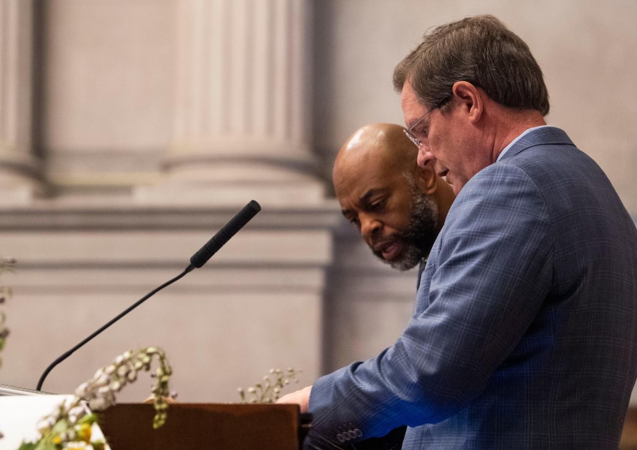 Rep. Harold Love Jr. speaks with House Speaker Cameron Sexton, during a house session while discussing a bill concerning the TSU board at the Tennessee Capitol in Nashville, Tenn., Thursday, March 28, 2024.