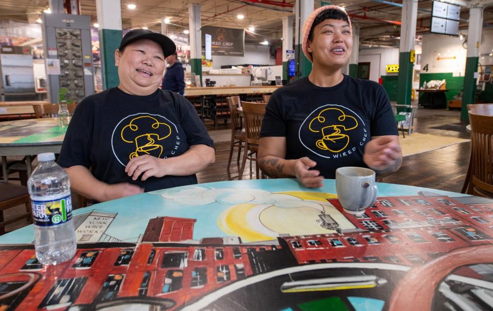 Trinh Zapata, left, with her daughter Delia Pabon share a smile when talking about starting their business Wired Chef in the New York Wire Works building.