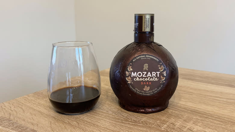 Glass and bottle of Mozart chocolate liqueur