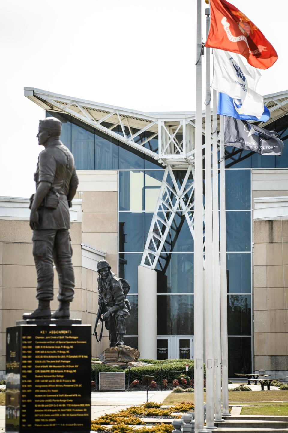 Gen. Hugh Shelton and Iron Mike statues in front of the Airborne and Special Operations Museum.