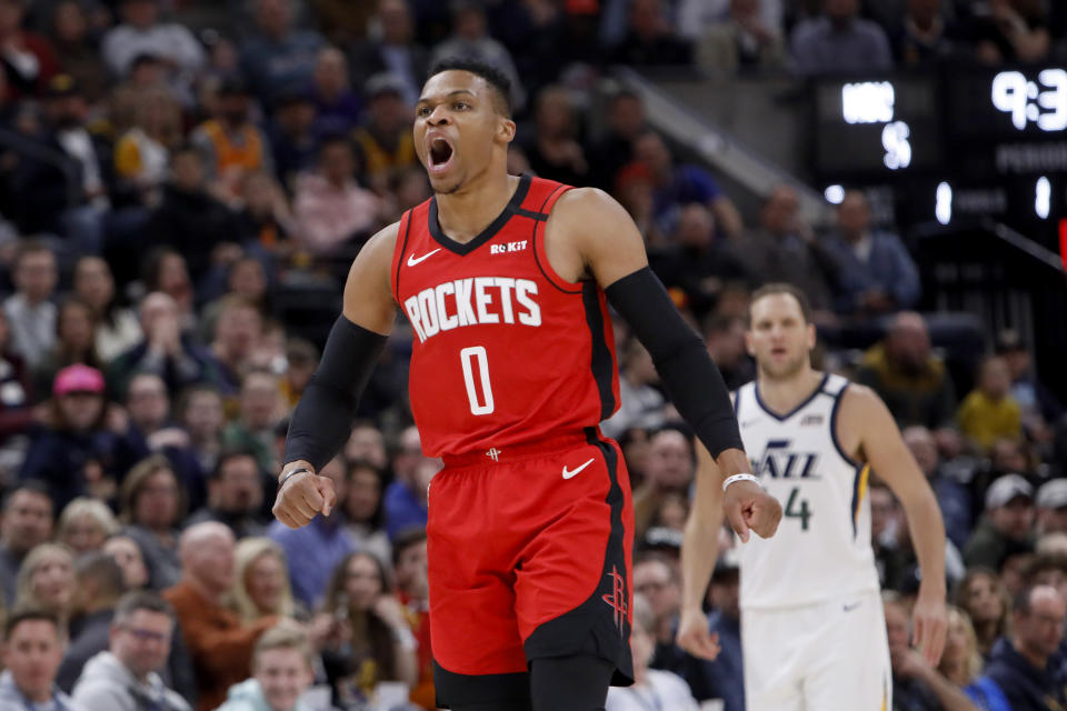 Houston Rockets' Russell Westbrook (0) reacts to scoring a basket off a rebound during the first half of the team's NBA basketball game against the Utah Jazz on Saturday, Feb. 22, 2020, in Salt Lake City. (AP Photo/Kim Raff)