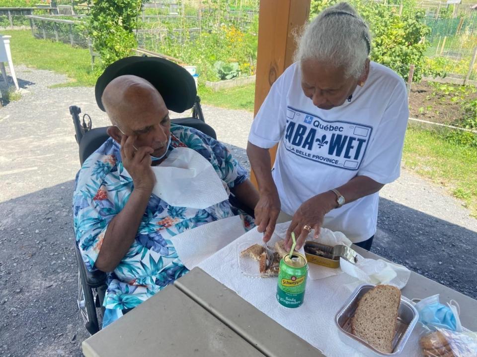 Francisco Antonio Rodrigues has suffered from Parkinson's disease for several years now. His wife Baroula, who lives in Dorval, says he's at his happiest when they  spend time in the garden she tends to. (Rowan Kennedy/CBC News - image credit)