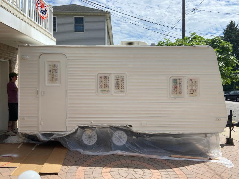 The couple worked on the trailer in their driveway.