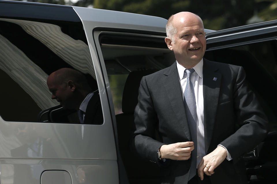 Britain's Foreign Secretary William Hague arrives to an Informal meeting of Ministers for Foreign Affairs at Zappeion Hall in Athens, on Friday, April 4, 2014. European Union foreign ministers meeting in Athens on Friday urged Russia to take concrete steps to pull troops back from its border with Ukraine but said they wanted to keep communication with Moscow open.(AP Photo/Petros Giannakouris)