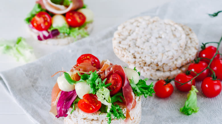 Caprese salad on surface of rice cake