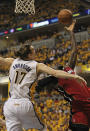 INDIANAPOLIS, IN - MAY 17: LeBron James #6 of the Miami Heat tries to get off a shot against Lou Amundson #17 of the Indiana Pacers in Game Three of the Eastern Conference Semifinals in the 2012 NBA Playoffs at Bankers Life Fieldhouse on May 17, 2012 in Indianapolis, Indiana. NOTE TO USER: User expressly acknowledges and agrees that, by downloading and/or using this photograph, User is consenting to the terms and conditions of the Getty Images License Agreement. (Photo by Jonathan Daniel/Getty Images)