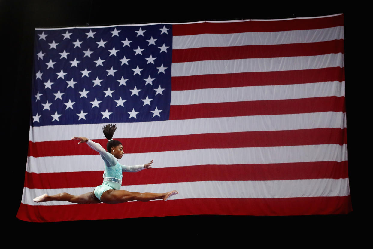 Simone Biles wore a teal leotard in solidarity of victims of sexual abuse [Photo: Getty]