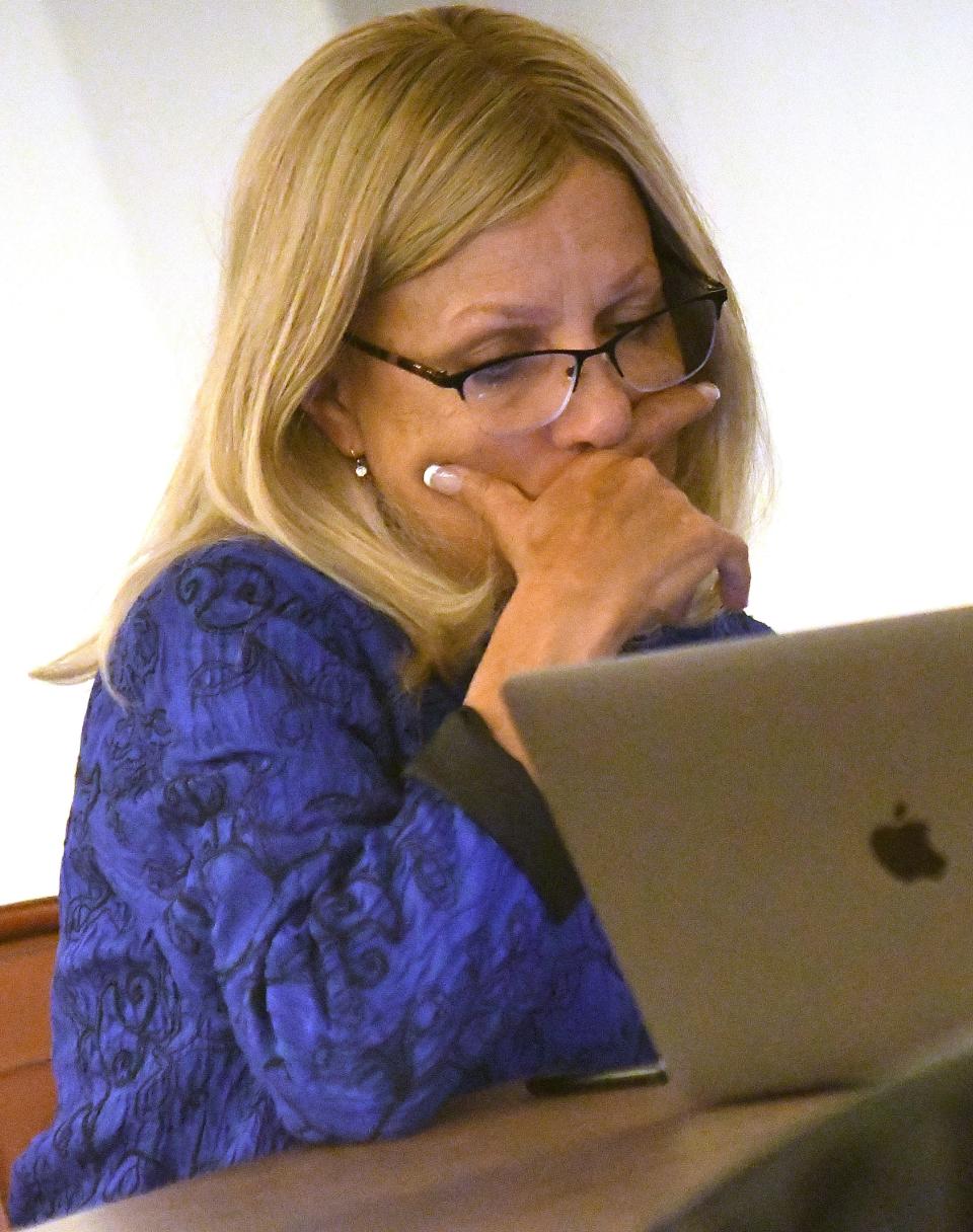 Salette Andrews checks election results Tuesday at Bull City Ciderworks. Andrews finished second in voting to earn one of three Wilmington City Council seats up for grabs, joining David Joyner and current councilman Kevin Spears.