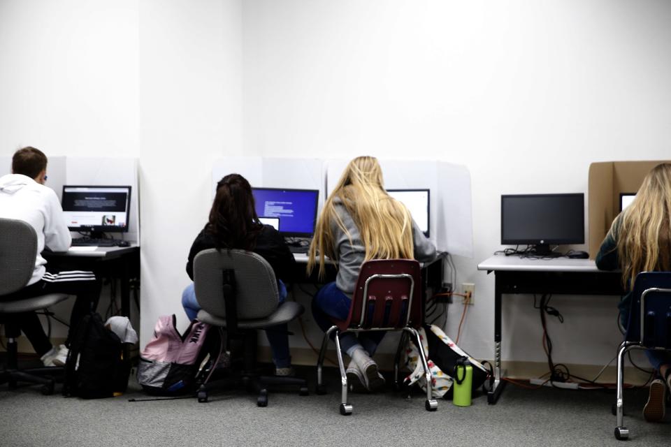 Students use computers at a New Mexico high school.