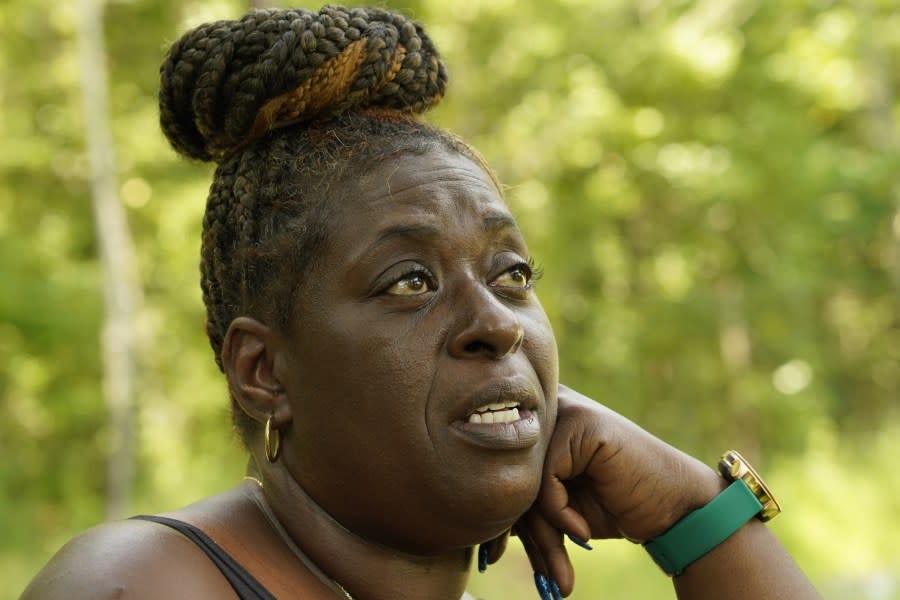 Monica Lee sits outside her Braxton, Miss., home, Friday, Aug. 4, 2023, and expresses her feelings about the investigation that led to six white former Mississippi law enforcement officers pleading guilty Thursday to federal civil rights offenses against two Black men who were brutalized during a home raid that ended when an officer shot one of the men in the mouth. (AP Photo/Rogelio V. Solis)