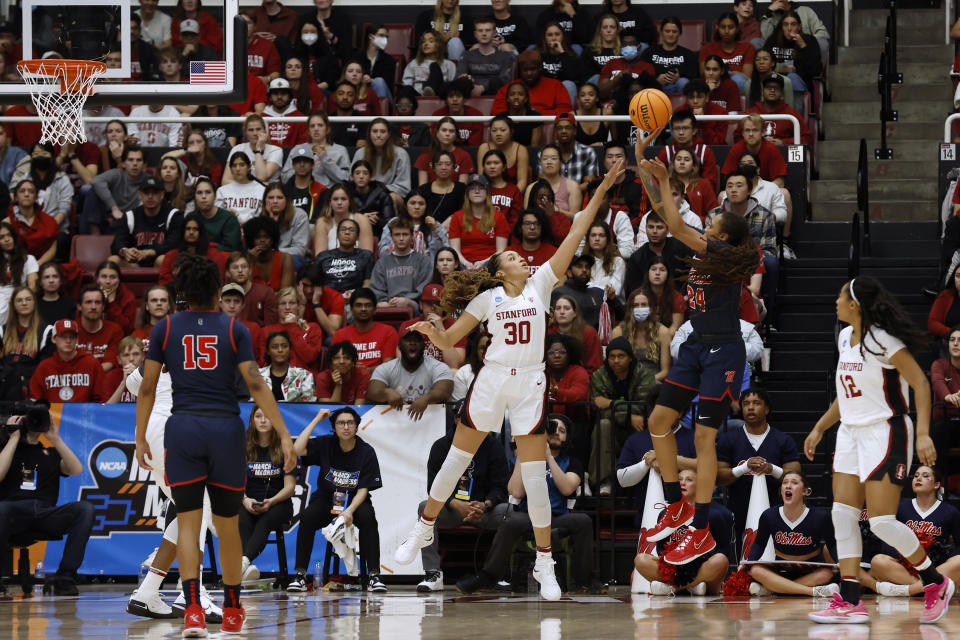 Mississippi forward Madison Scott, right, takes a shot to score against Stanford guard Haley Jones (30) during the second half of a second-round college basketball game in the women's NCAA Tournament, Sunday, March 19, 2023, in Stanford, Calif. (AP Photo/Josie Lepe)