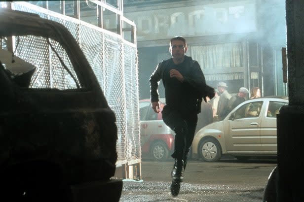 A scene from the movie “Minority Report,” which involves futuristic police in a “pre-crime” unit. Author Mark Follman said heading off school shootings doesn’t have to criminalize students’ concerning behaviors, instead asking adults to “step in and figure out what the root problems are and get them the help and support they need.” (20th Century-Fox/Getty Images)