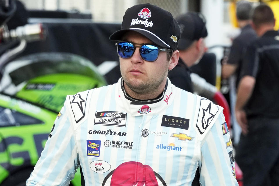 Noah Gragson walks to his garage during a practice session for the NASCAR Daytona 500 auto race (John Raoux / AP file)