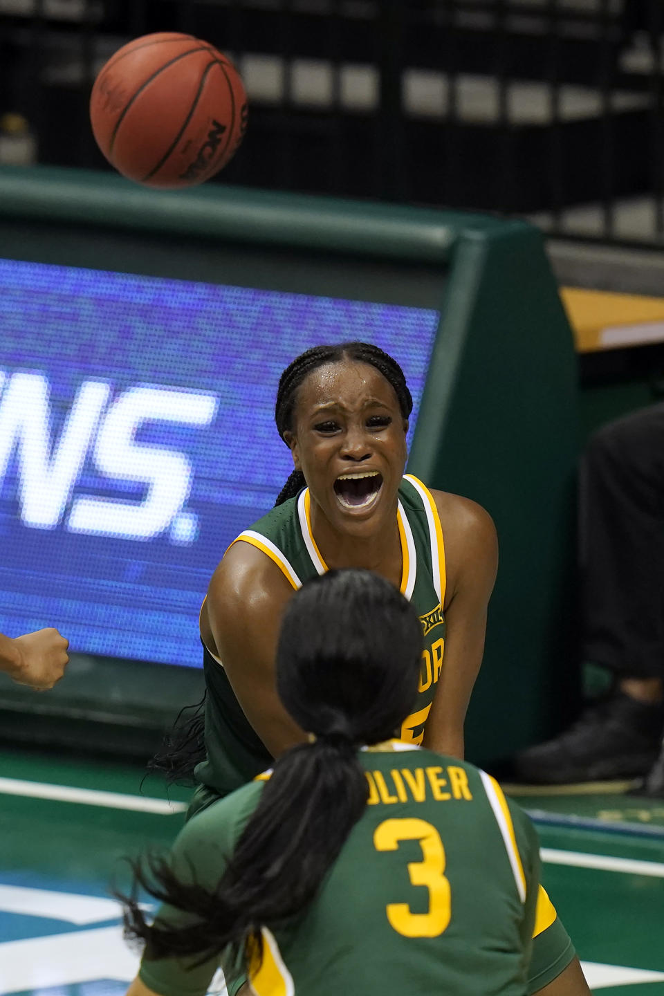 Baylor center Queen Egbo celebrates with guard Trinity Oliver (3) after scoring against the South Florida during the second half of an NCAA women's college basketball game Tuesday, Dec. 1, 2020, in Tampa, Fla. (AP Photo/Chris O'Meara)