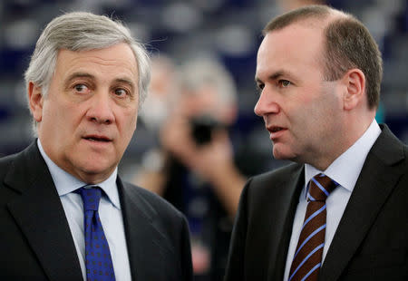 European Parliament's presidential candidate Antonio Tajani (L) talks with Manfred Weber, Chairman of the EPP group, as they attend the election of the new President of the European Parliament in Strasbourg, France, January 17, 2017. REUTERS/Christian Hartmann