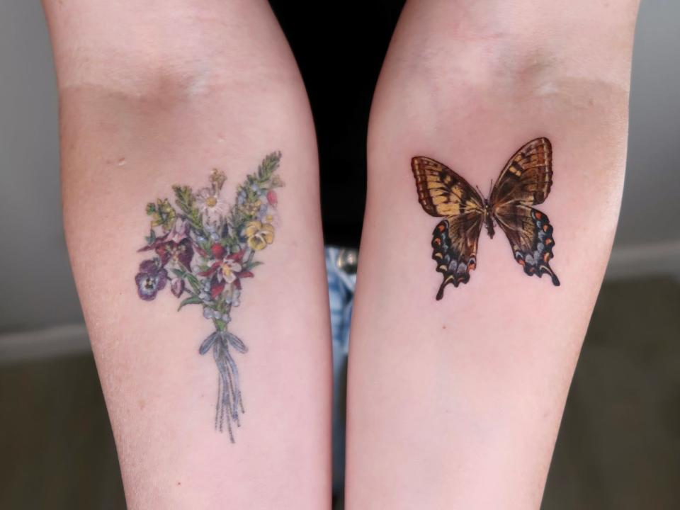 Two healed tattoos — a flower bouquet and butterfly — on arms