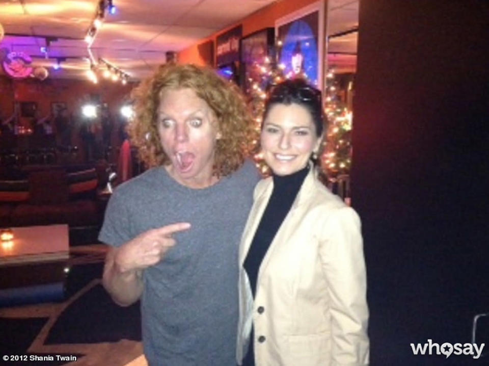 Vegas performers unite! Now that she’s performing in a show at Caesars Palace in Sin City, country crooner Shania Twain is making some local friends. “Short break Monday night,” the 47-year-old posted to her a <a href="http://www.whosay.com/shaniatwain" rel="nofollow noopener" target="_blank" data-ylk="slk:WhoSay page;elm:context_link;itc:0;sec:content-canvas" class="link ">WhoSay page</a> on Tuesday, along with this photo of her and the comic. "Lots of laughs at Carrot Top’s show. He is brilliant and super nice in person," she wrote. (12/4/2012)