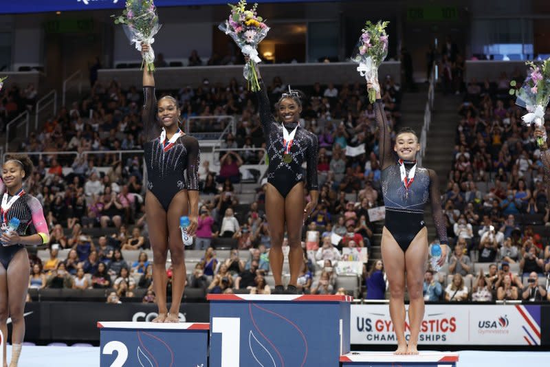 Simone Biles (C) won the all-around title at the U.S. Gymnastics Championships, while Shilese Jones (L) and Leanne Wong finished second and third, respectively, Sunday in San Jose, Calif. Photo by John G. Mabanglo/EPA-EFE