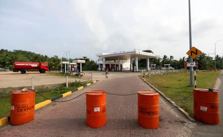 A closed Ceylon Petroleum fuel station is seen near the highway entrance in Galle, Sri Lanka July 26, 2017. REUTERS/Dinuka Liyanawatte