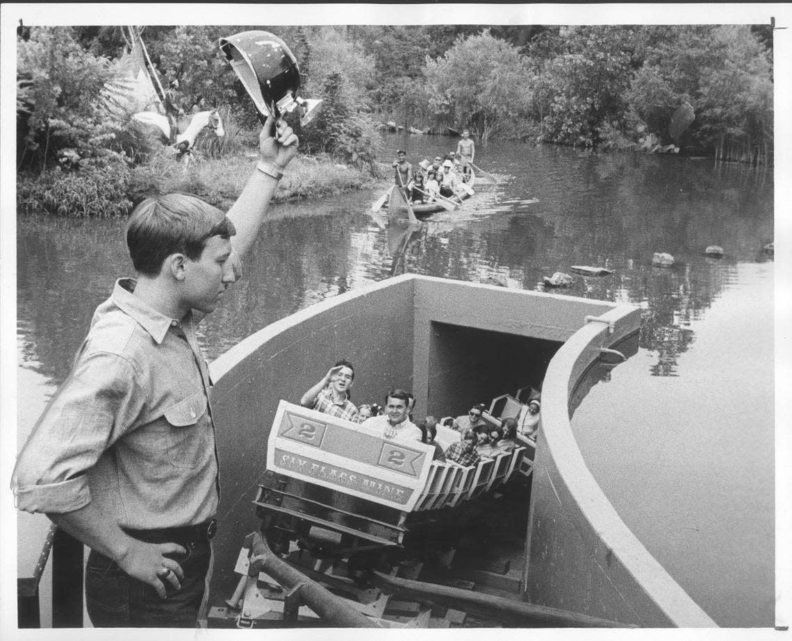 July 24, 1966: Steve Schellenberg waves a hat to a group on the debut ride “Run-a-Way Mine Train.”