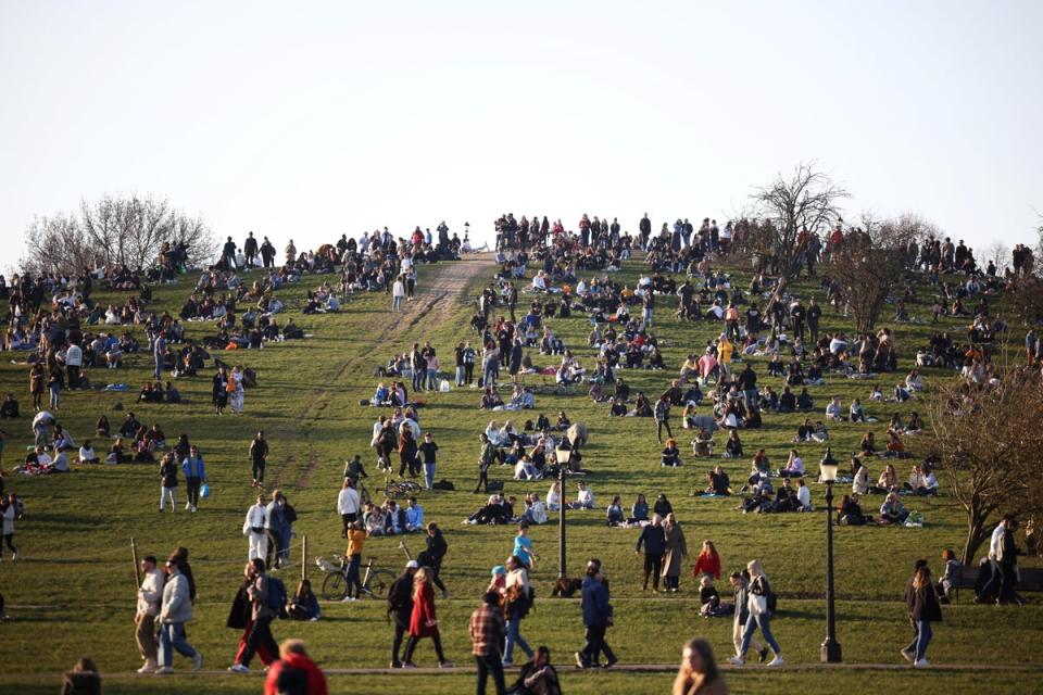 People flocked to Primrose Hill during the pandemic (REUTERS)