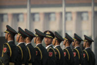 Members of a Chinese honor guard stand in formation before a ceremony to mark Martyr's Day at Tiananmen Square in Beijing, Monday, Sept. 30, 2019, ahead of a massive celebration of the People's Republic's 70th anniversary. (AP Photo/Mark Schiefelbein, Pool)