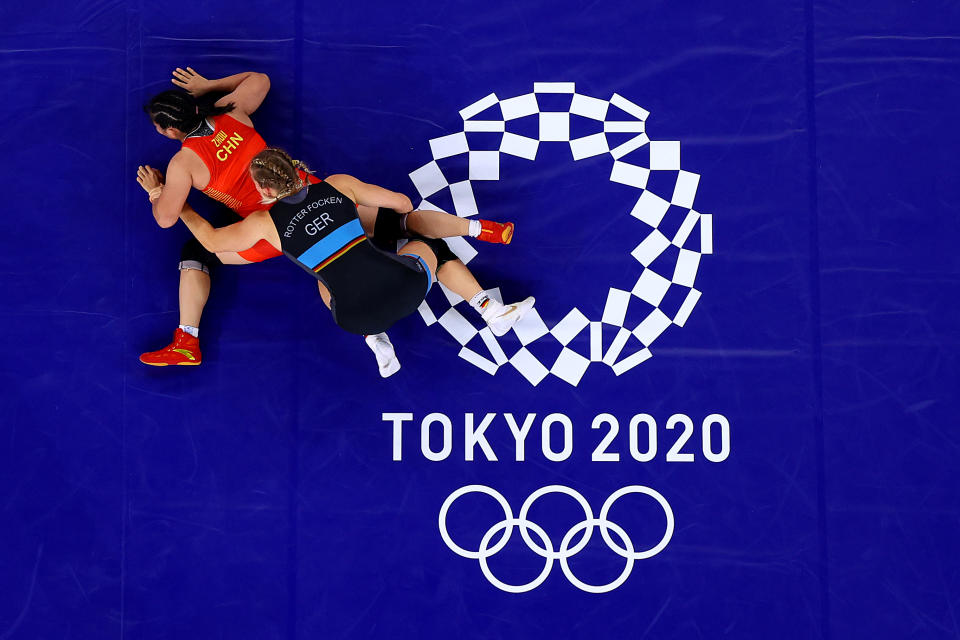 <p>Aline Rotter Focken of Team Germany competes against Qian Zhou of Team China during the Women's Freestyle 76kg Quarter Final on day nine of the Tokyo 2020 Olympic Games at Makuhari Messe Hall on August 01, 2021 in Chiba, Japan. (Photo by Rob Carr/Getty Images)</p> 