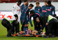 Soccer Football - Europa League Round of 16 Second Leg - Lokomotiv Moscow vs Atletico Madrid - RZD Arena, Moscow, Russia - March 15, 2018 Atletico Madrid's Filipe Luis is stretchered off after sustaining an injury REUTERS/Sergei Karpukhin