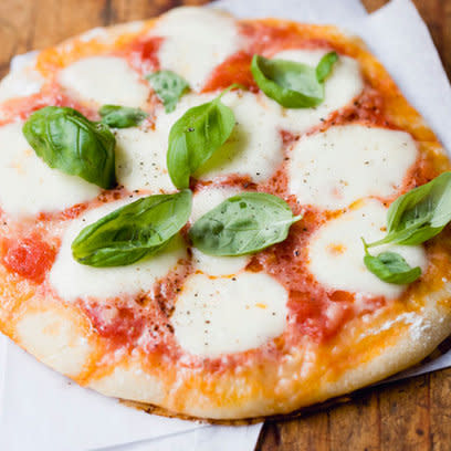 <b>Buffalo mozzarella and tomato pizza</b><br><br> Pizzas are much easier to make than you think and can take a lot of abuse so are perfect to make with children. <br><br> <a href="http://uk.lifestyle.yahoo.com/buffalo-mozzarella-and-tomato-pizza.html" data-ylk="slk:See the full recipe here;elm:context_link;itc:0;sec:content-canvas;outcm:mb_qualified_link;_E:mb_qualified_link;ct:story;" class="link  yahoo-link"><b>See the full recipe here</b></a>