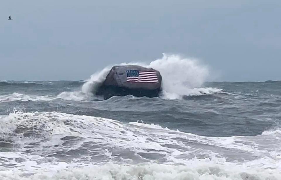 In the lead-up to high tide on Saturday Sept. 16, 2023, wave surges crash against Flag Rock off White Horse Beach in the Manomet section of Plymouth as a weakened Lee continues its northeastern trek towards Canada.