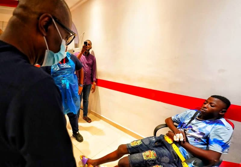 Lagos State Goveror Babajide Sanwo-Olu visits injured people at a hospital in Lagos