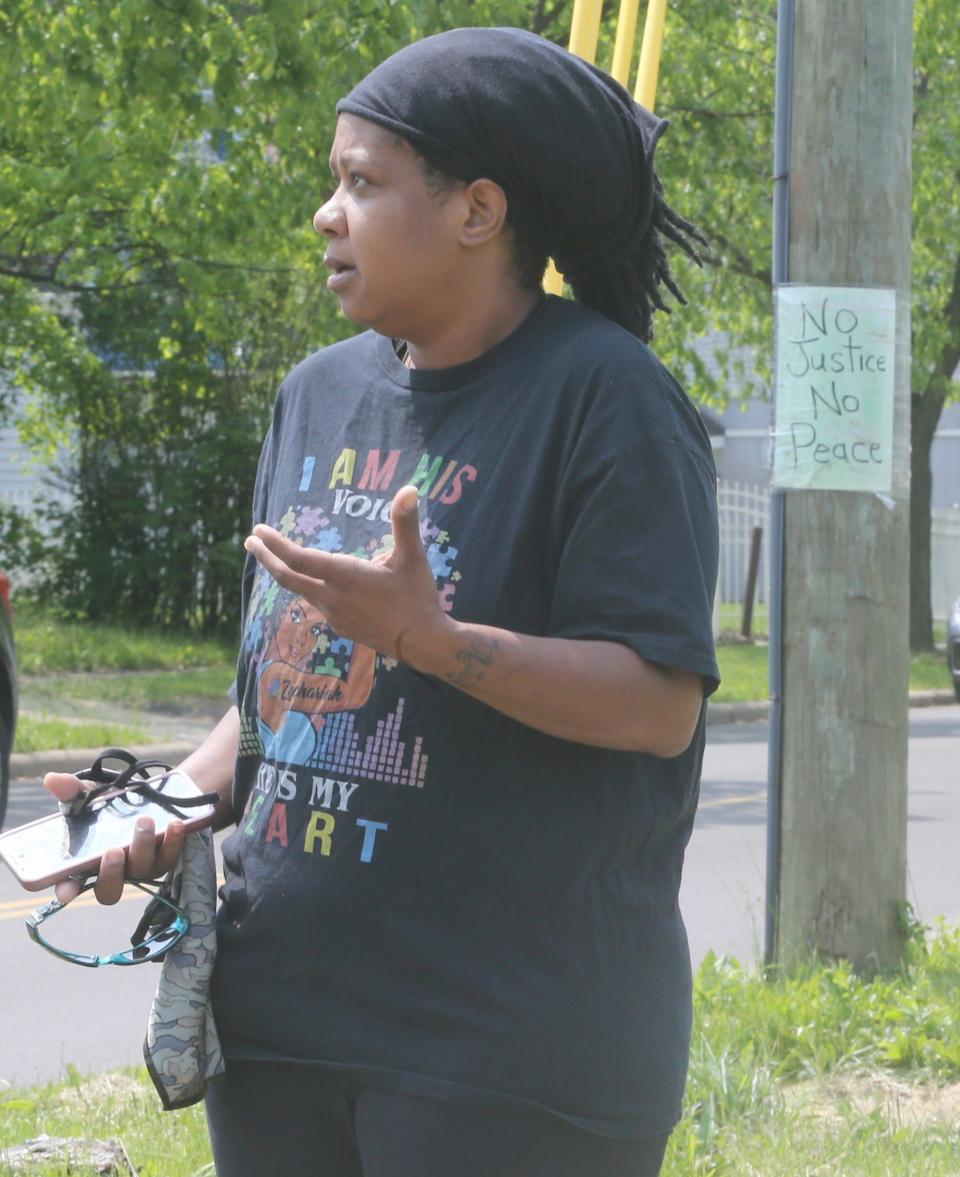 Tamara Coteat talks about her experience during an April 19 protest on Copley Road in Akron.