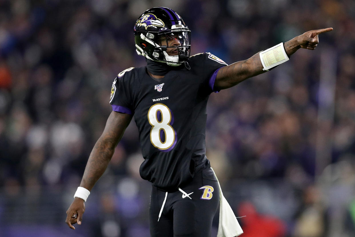 Baltimore Ravens QB Lamar Jackson broke Michael Vick's NFL record for QB rush yards in a season. (Photo by Patrick Smith/Getty Images)