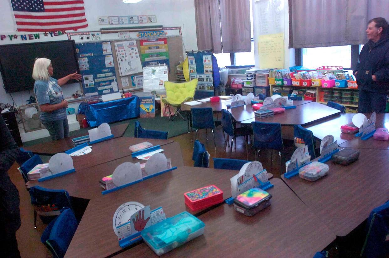 Mindy Dropsey talks about her classroom during an open house tribute tour of Hillsdale Elementary School.