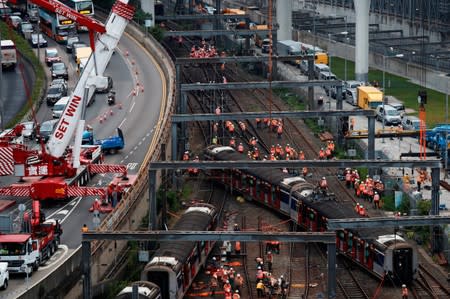 A MTR train is seen derailed on the East Rail line in Hong Kong