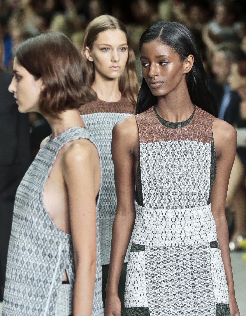 Fashion from the Calvin Klein Spring 2014 collection is modeled on Thursday, Sept. 12, 2013 in New York. (AP Photo/Bebeto Matthews)