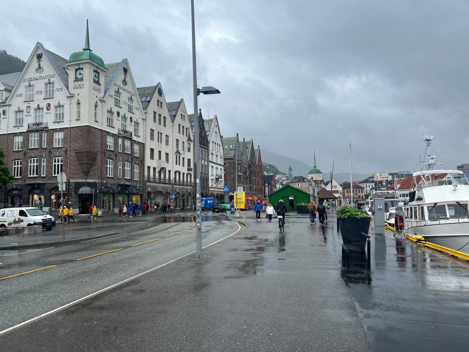 Bergen, city street scene with boats to the right