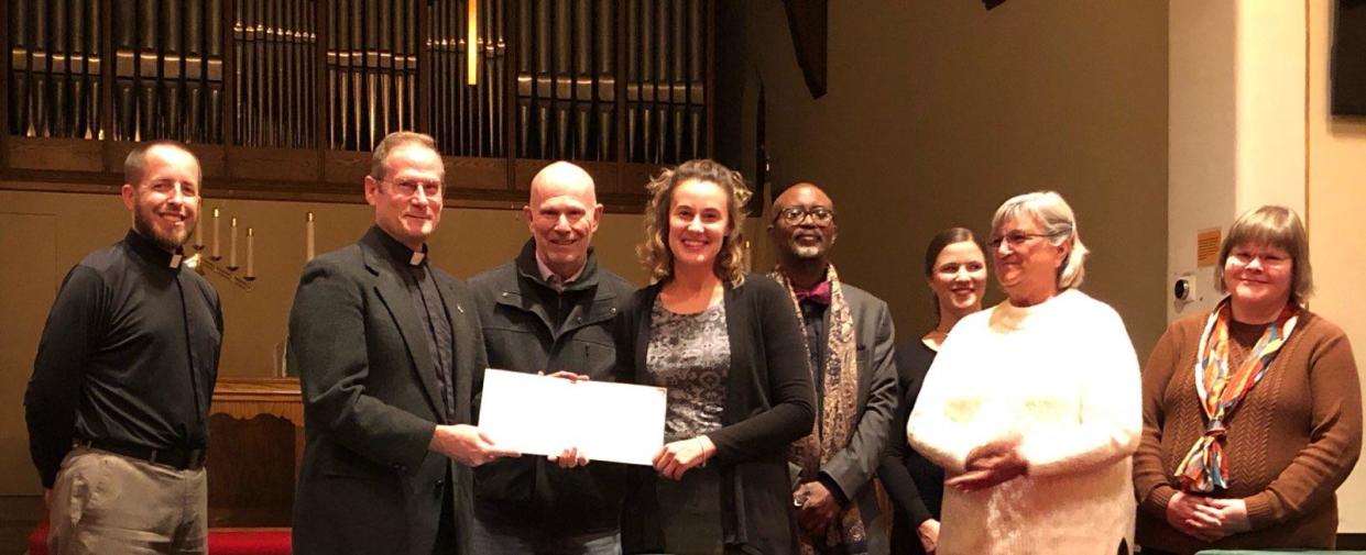 A check was presented recently to Selah's Center of Hope at Monroe’s Grace Church. Pictured are (from left): Pastor Mark Witte, Pastor Curtis Garland, Bill Sunderland, Kara Dowler, Dr. Kojo Quartey, Karen Daniel, Bonnie Stewart and Jennifer Connelly. PROVIDED