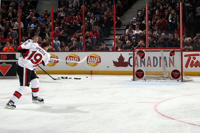 OTTAWA, ON - JANUARY 28: Jason Spezza #19 of the Ottawa Senators and team Alfredsson takes a shot during the Canadian Tire NHL Accuracy Shooting part of the 2012 Molson Canadian NHL All-Star Skills Competition at Scotiabank Place on January 28, 2012 in Ottawa, Ontario, Canada. (Photo by Bruce Bennett/Getty Images)