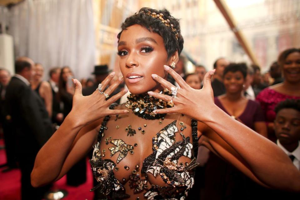 <p><strong>Janelle Monae</strong> tops her pixie cut with an embellished gold headband, which complements her <a href="https://www.goodhousekeeping.com/beauty/anti-aging/a28541767/how-to-get-glowing-skin-tips/" rel="nofollow noopener" target="_blank" data-ylk="slk:glowing skin;elm:context_link;itc:0;sec:content-canvas" class="link ">glowing skin</a>.</p>