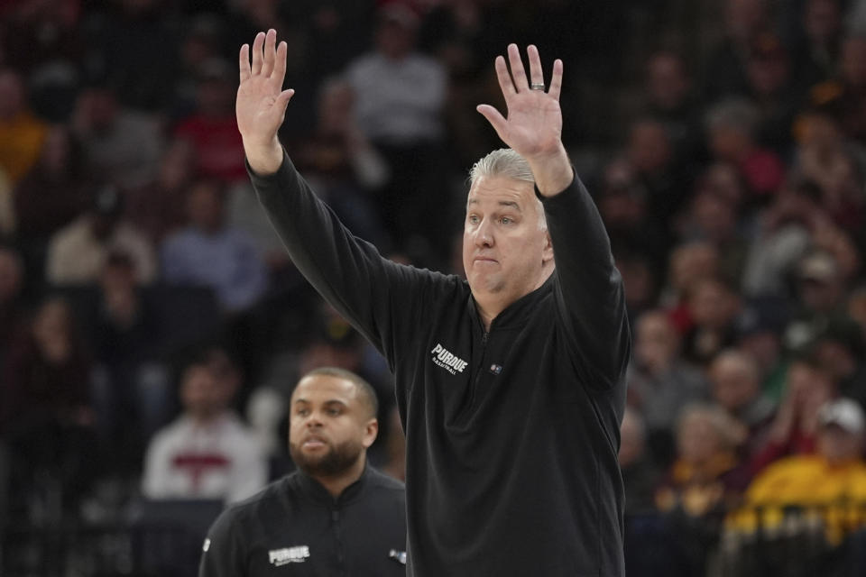 Purdue head coach Matt Painter signals during the second half of an NCAA college basketball game against Wisconsin in the semifinal round of the Big Ten Conference tournament, Saturday, March 16, 2024, in Minneapolis. (AP Photo/Abbie Parr)