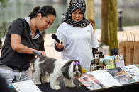 <p>Cassandra Chiu gives dog grooming tips at Howlloween at the Grand Copthorne Waterfront Hotel. (Photo: Bryan Huang/Yahoo Lifestyle Singapore)</p>