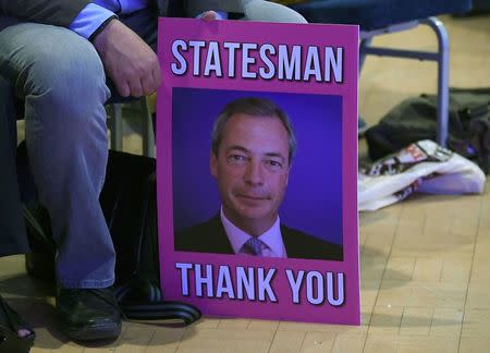 A supporter holds a poster of Nigel Farage, the outgoing leader of the United Kingdom Independence Party (UKIP), at the party's annual conference in Bournemouth, Britain, September 16, 2016. REUTERS/Toby Melville