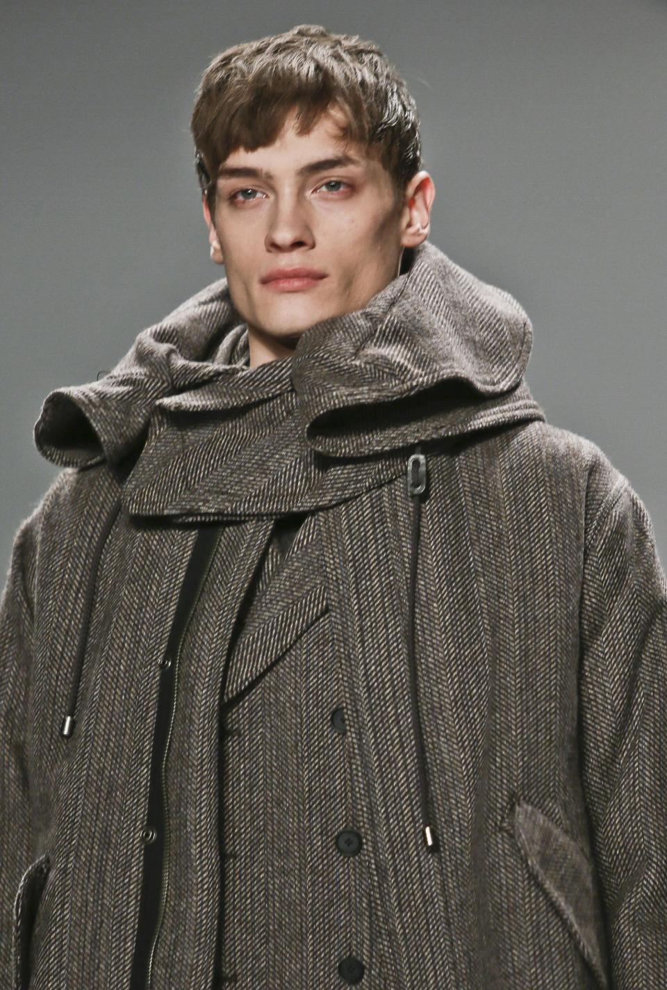 Fashion from the Fall 2013 collection of Richard Chai is modeled on Thursday, Feb. 7, 2013 in New York. (AP Photo/Bebeto Matthews)