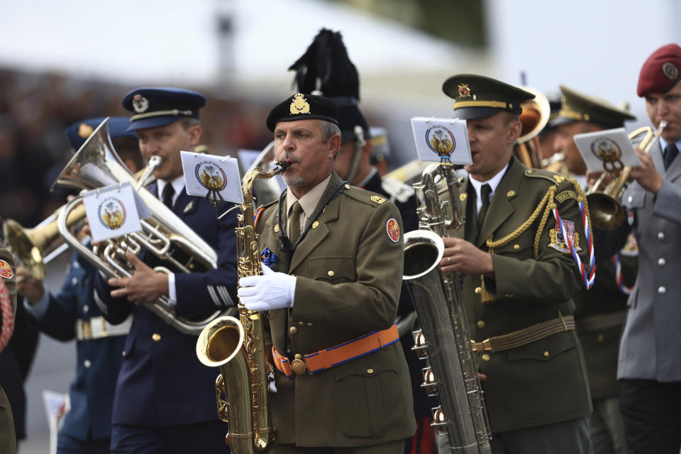 An international military band performs on Place de la Concorde during the Bastille Day military parade Friday, July 14, 2023 in Paris. India is the guest of honor at this year's Bastille Day parade, with Prime Minister Narendra Modi in the presidential tribune alongside French President Emmanuel Macron. (AP Photo/Aurelien Morissard)